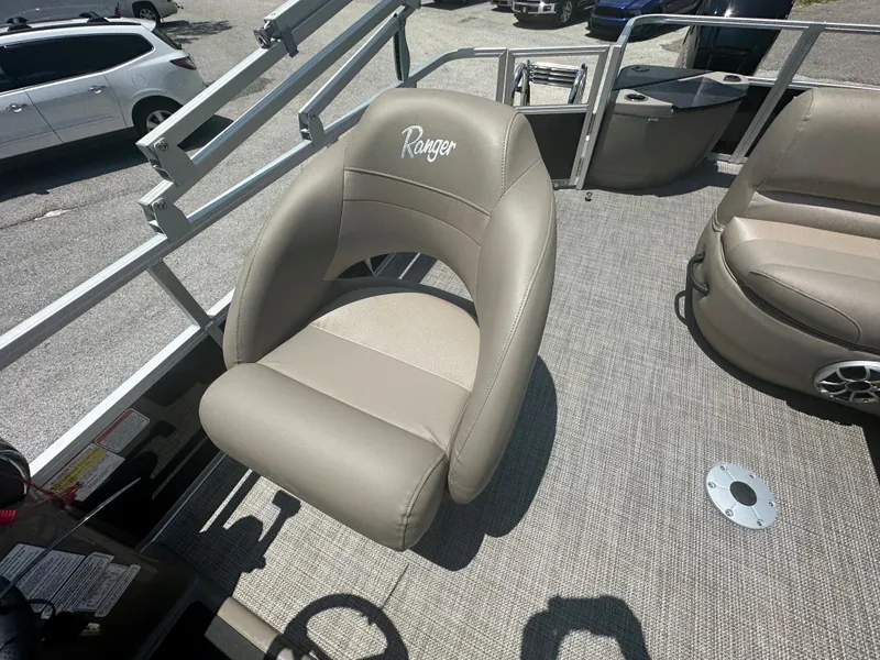 Slide: The Image of 2024 Ranger Reata 200F boat seat in beige upholstery. - 8
