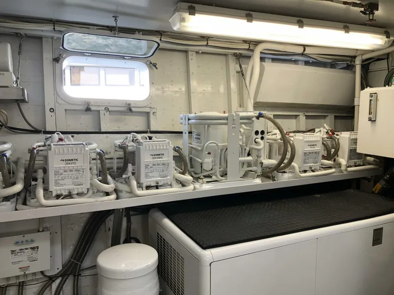 Slide: The Image of Engine room of a 1972 Trumpy 72 Houseboat with Dometic equipment. - 33
