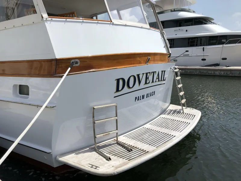 Slide: The Image of 1972 Trumpy 72 Houseboat Dovetail docked in Palm Beach marina. - 5