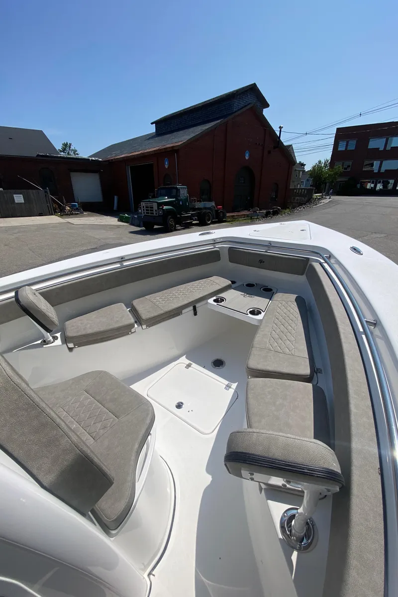 Slide: The Image of 2023 Sea Pro 259 boat with spacious seating and modern design. - 18