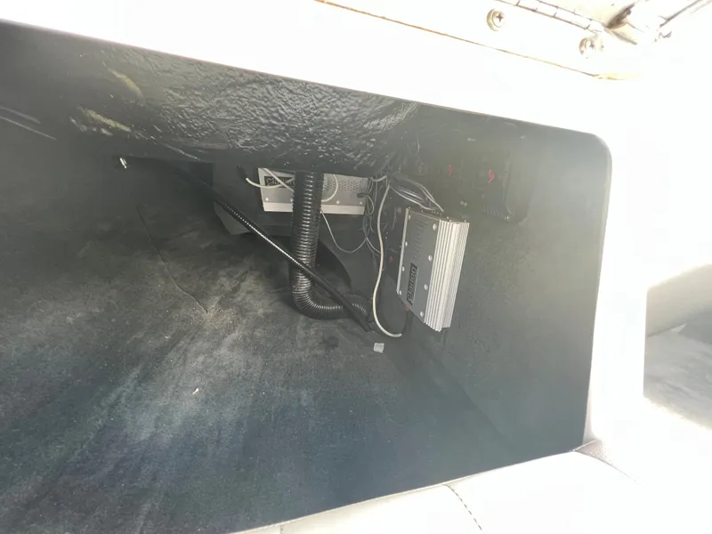 Slide: The Image of 2004 MasterCraft X30 boat interior wiring and components. - 12