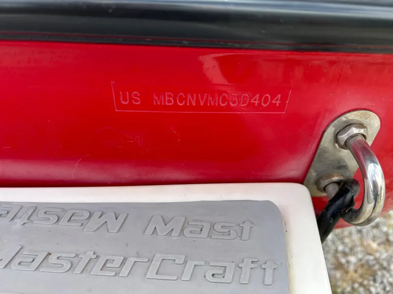 Slide: The Image of 2004 MasterCraft X30 boat hull identification number (HIN) and branding. - 13
