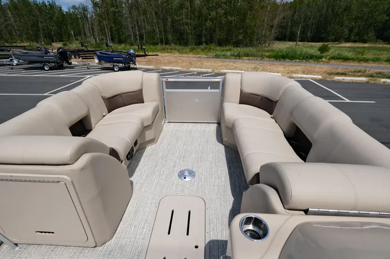 Slide: The Image of 2023 SunCatcher Fusion 322RC pontoon boat with spacious seating and modern design. - 10