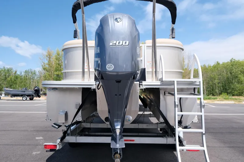 Slide: The Image of 2023 SunCatcher Fusion 322RC pontoon boat with Yamaha 200 engine, rear view. - 4