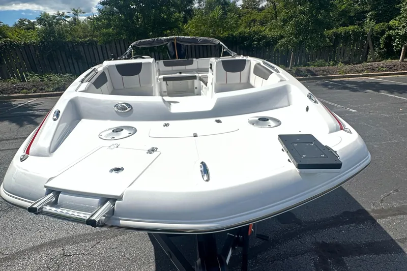 Slide: The Image of 2024 Tahoe 2150 deck boat with spacious seating and modern design. - 2