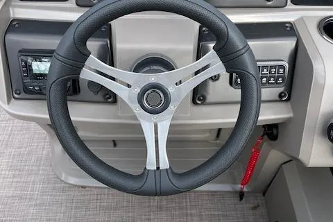 Slide: The Image of Steering wheel of 2024 Sun Tracker SportFish 22 DLX pontoon boat. - 12