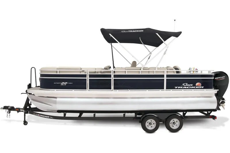Slide: The Image of 2024 Sun Tracker SportFish 22 DLX pontoon boat with canopy on trailer. - 12