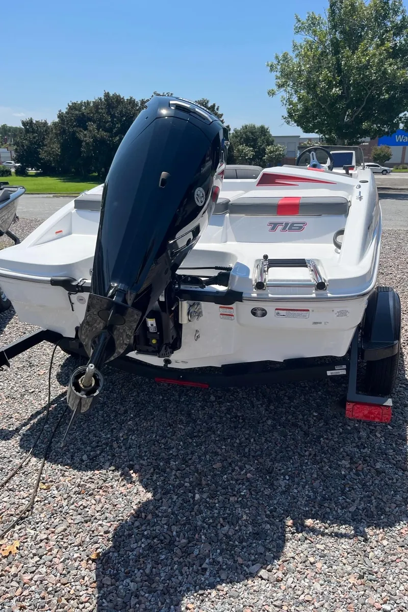Slide: The Image of 2024 Tahoe T16 boat with outboard motor, rear view. - 4