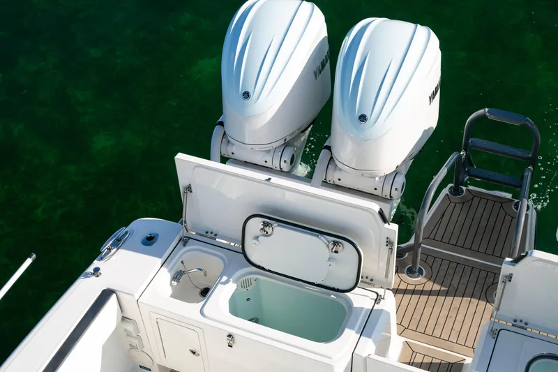 Slide: The Image of 2022 World Cat 400CC-X boat with twin outboard engines and deck features. - 17