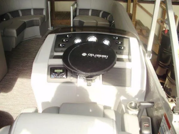 Slide: The Image of 2023 Bennington 21LSAPG boat interior with steering wheel and dashboard. - 3