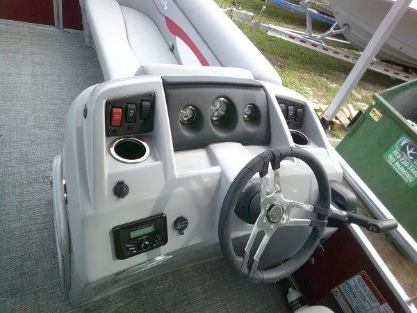 Slide: The Image of 2024 Bennington 188SVL boat dashboard with steering wheel and control panel. - 3