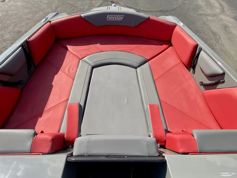 Slide: The Image of 2022 Heyday WTSurf boat with red and gray seating. - 7