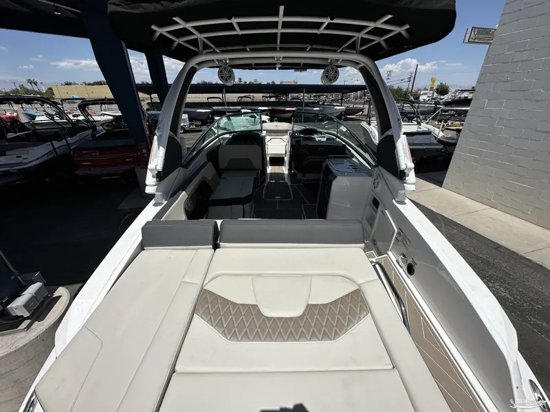 Slide: The Image of 2024 Monterey 305SS boat interior with spacious seating and modern design. - 2