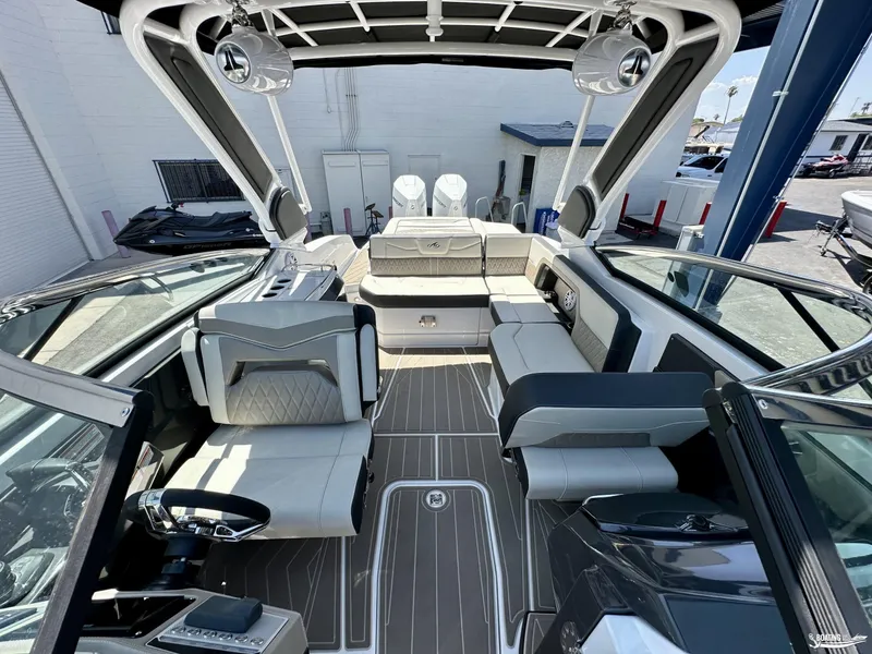 Slide: The Image of 2024 Monterey 305SS boat interior with luxury seating and modern design. - 5