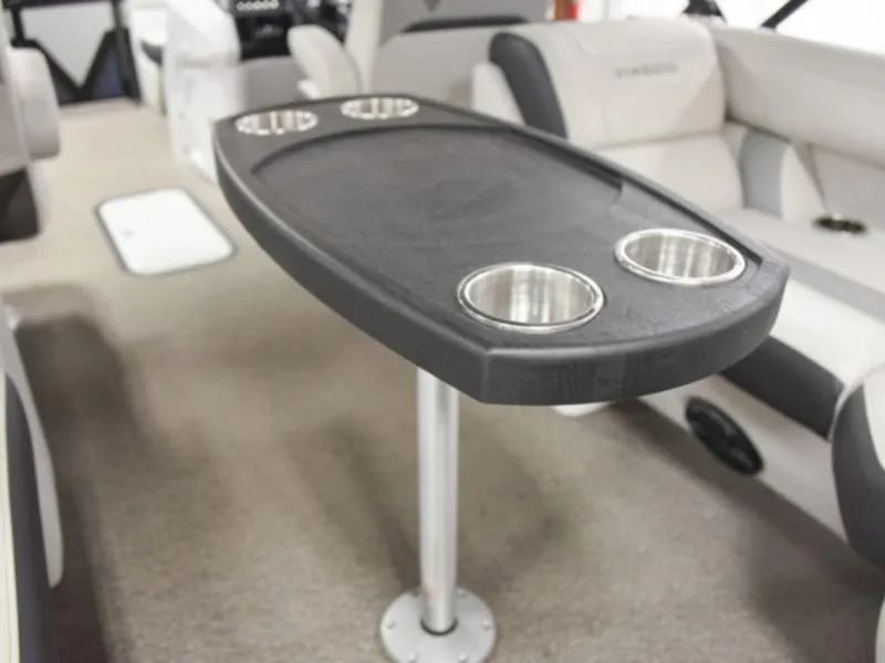 Slide: The Image of 2022 VIAGGIO by Misty Harbor Diamante U D23U boat interior with table and cup holders. - 8