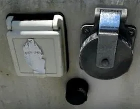 Slide: The Image of Electrical outlets on a 1986 Pearson 303 boat. - 19