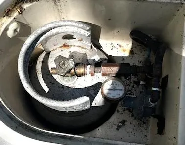 Slide: The Image of Propane tank setup in a 1986 Pearson 303 sailboat. - 9