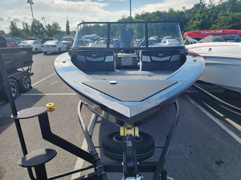 Slide: The Image of 2023 Ranger VX1888 WT boat on trailer in parking lot. - 2