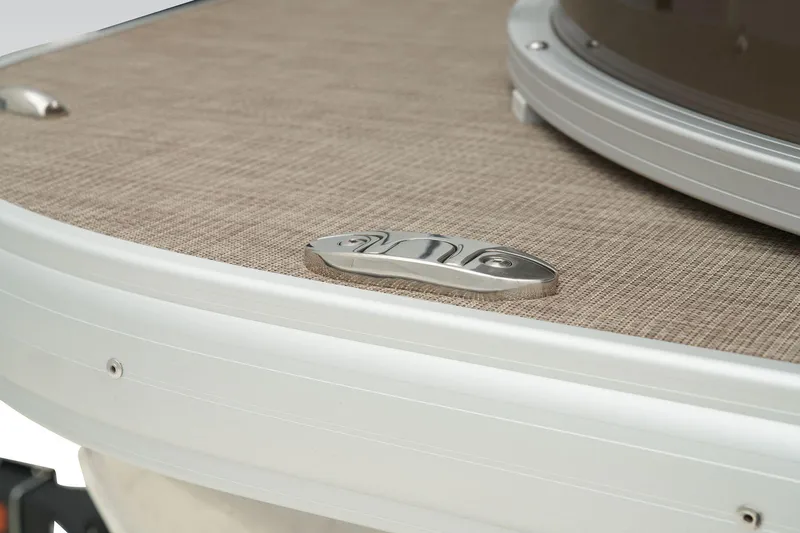Slide: The Image of Close-up of 2024 Sun Tracker SportFish 22 XP3 deck with cleat. - 23