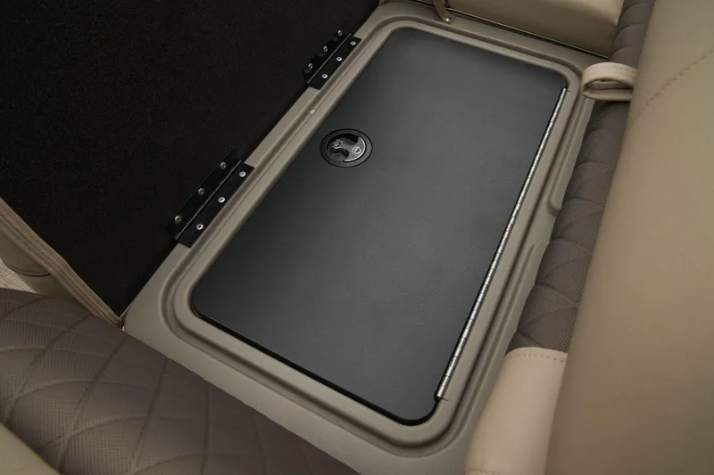 Slide: The Image of 2024 Sun Tracker SportFish 22 XP3 under-seat storage compartment. - 29
