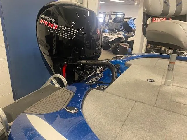 Slide: The Image of 2024 Nitro Z18 Pro boat with Mercury Pro XS engine in showroom. - 3