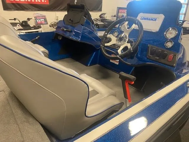 Slide: The Image of 2024 Nitro Z18 Pro boat interior with steering wheel and dashboard. - 4