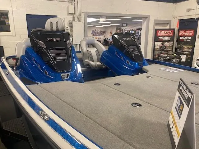 Slide: The Image of 2024 Nitro Z18 Pro boat with dual seats and sleek design in showroom. - 5