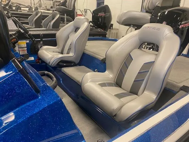 Slide: The Image of 2024 Nitro Z18 Pro boat interior with sleek gray seats and blue accents. - 7