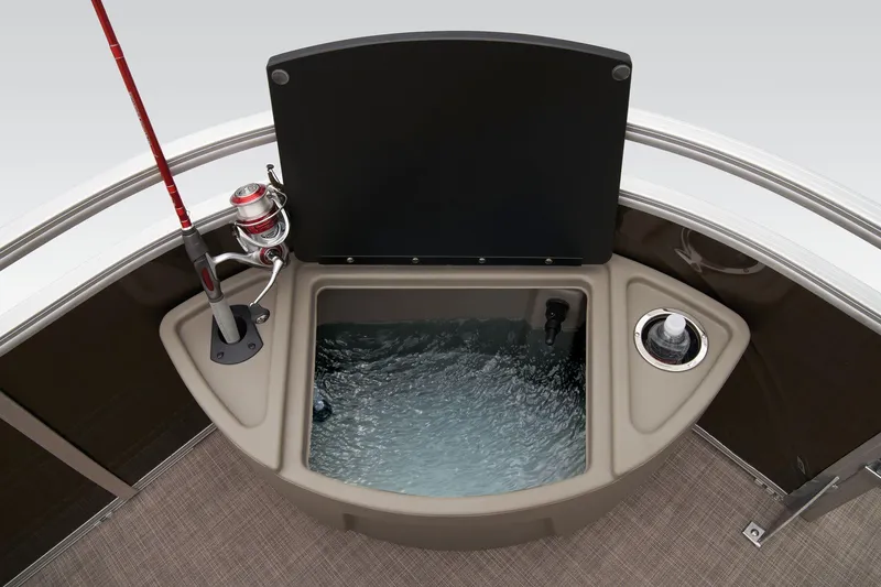 Slide: The Image of 2024 Sun Tracker Sportfish 24 XP3 livewell and fishing rod holder. - 23