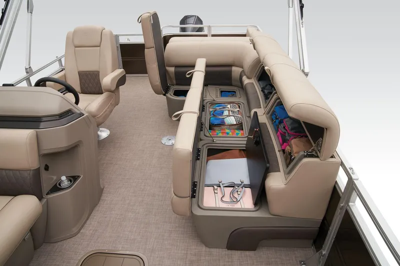 Slide: The Image of 2024 Sun Tracker Sportfish 24 XP3 interior with storage compartments open. - 46
