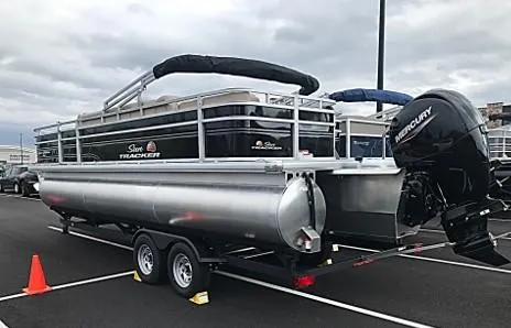 Slide: The Image of 2024 Sun Tracker Sportfish 24 XP3 pontoon boat with Mercury outboard motor. - 5