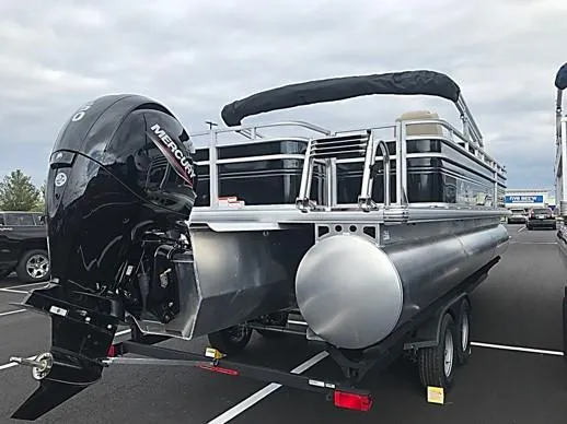 Slide: The Image of 2024 Sun Tracker Sportfish 24 XP3 pontoon boat with Mercury outboard engine. - 6