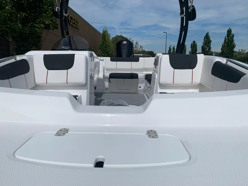 Slide: The Image of 2024 Tahoe 1950 boat interior with sleek seating and modern design. - 3