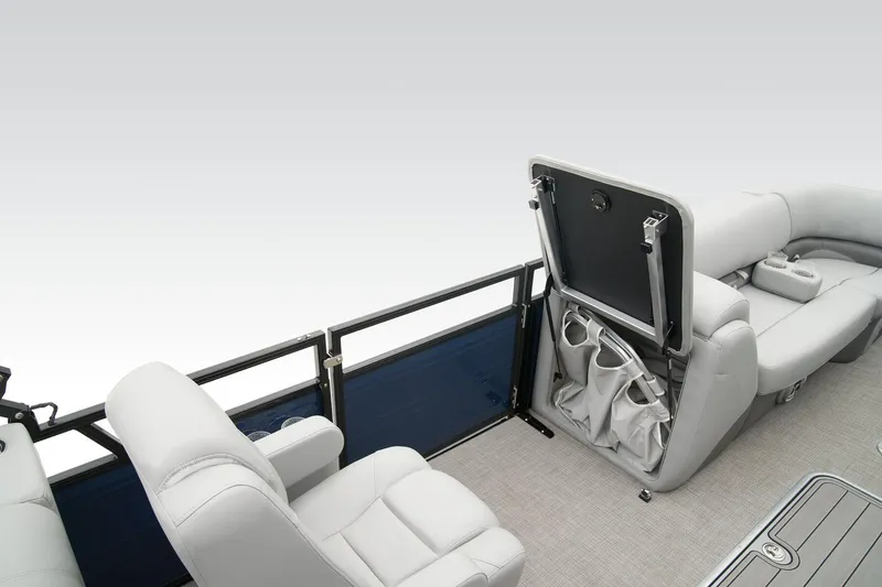 Slide: The Image of 2024 Regency 230 DL3 boat interior with storage compartments and seating. - 47