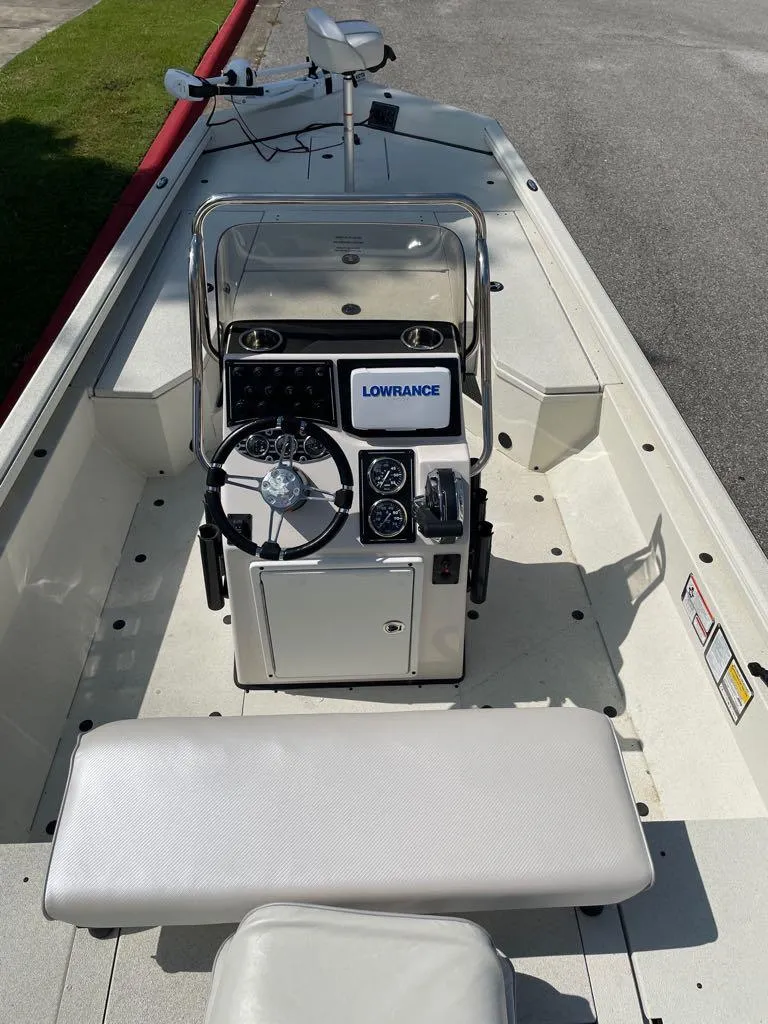 Slide: The Image of 2023 Ranger RB200 boat interior with steering console and Lowrance electronics. - 3