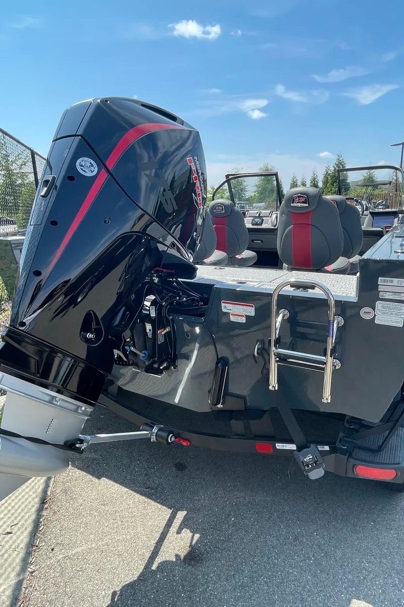 Slide: The Image of 2023 Ranger VX1788 WT boat with powerful outboard motor and seating. - 4