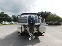 Slide: The Image of 2024 Sun Tracker Fishin' Barge 22 XP3 pontoon boat rear view. - 4