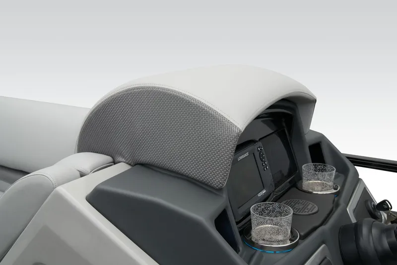 Slide: The Image of 2024 Regency 230 DL3 boat dashboard with cup holders and navigation system. - 44