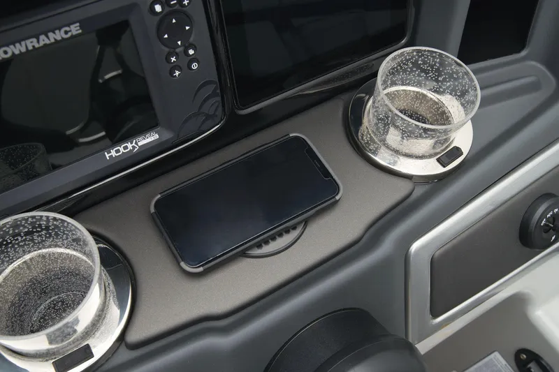 Slide: The Image of Dashboard of 2024 Regency 230 DL3 with phone holder and cup holders. - 46