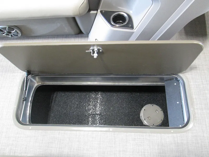 Slide: The Image of Open storage compartment in 2024 Sun Tracker Party Barge 22 XP3 pontoon boat. - 11