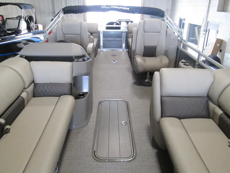 Slide: The Image of 2024 Sun Tracker Party Barge 22 XP3 interior with spacious seating and modern design. - 4