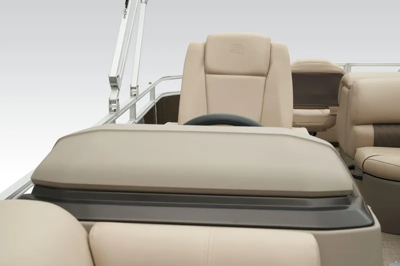 Slide: The Image of 2024 Sun Tracker SportFish 22 XP3 boat interior with beige seating. - 26
