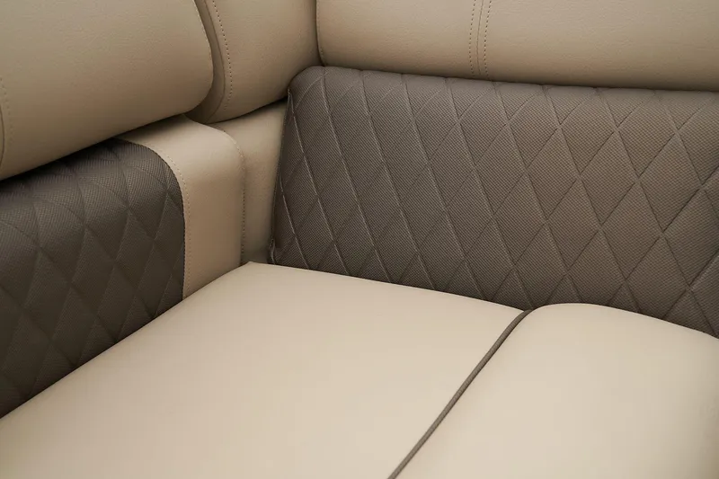 Slide: The Image of 2024 Sun Tracker SportFish 22 XP3 beige and brown diamond-stitched upholstery. - 49