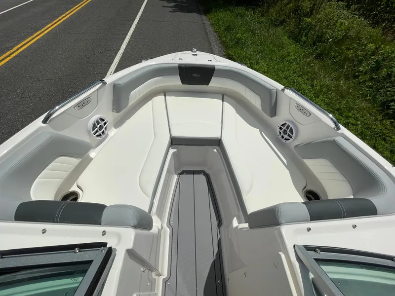 Slide: The Image of 2024 Chaparral 21 SSi OB boat interior with spacious seating and modern design. - 14