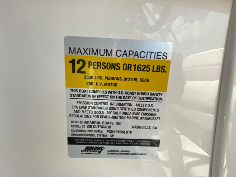 Slide: The Image of 2024 Chaparral 21 SSi OB boat capacity label, 12 persons or 1625 lbs, 200 HP motor. - 27