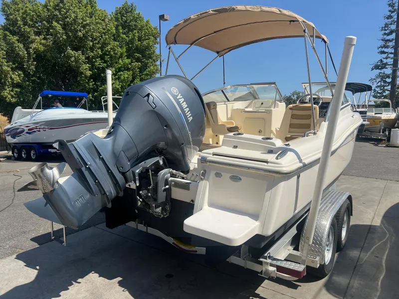 Slide: The Image of 2019 Scout 210 Dorado boat with Yamaha outboard motor on trailer. - 6
