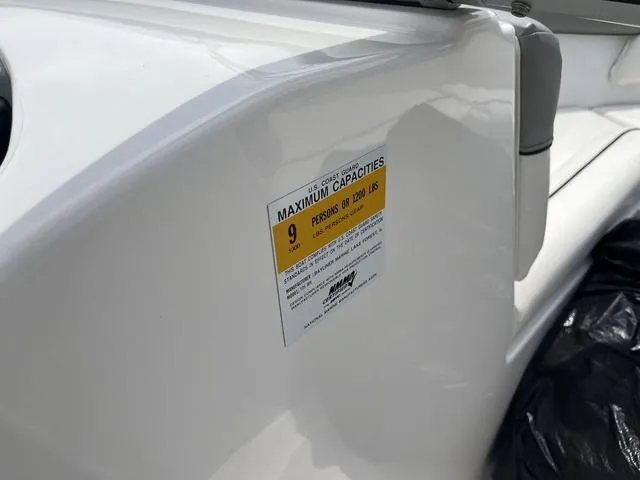 Slide: The Image of 2012 Bayliner 195 Bowrider capacity label, maximum 9 persons or 1200 lbs. - 10