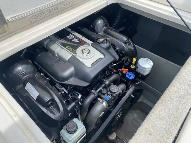 Slide: The Image of 2012 Bayliner 195 Bowrider engine compartment with MerCruiser 4.3L MPI engine. - 11