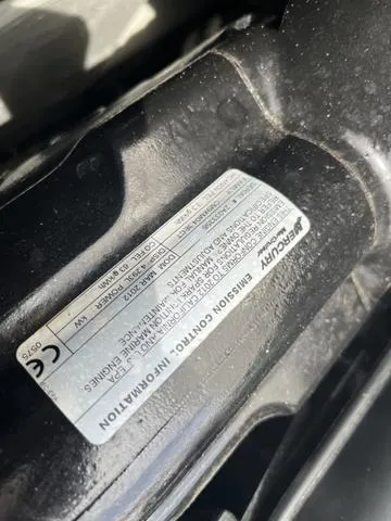 Slide: The Image of 2012 Bayliner 195 Bowrider engine emission control information label - 12