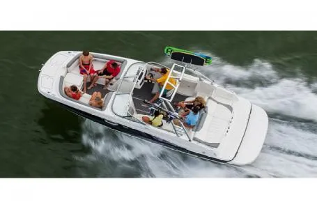 Slide: The Image of 2016 Bayliner 215 Deck Boat cruising with passengers. - 5